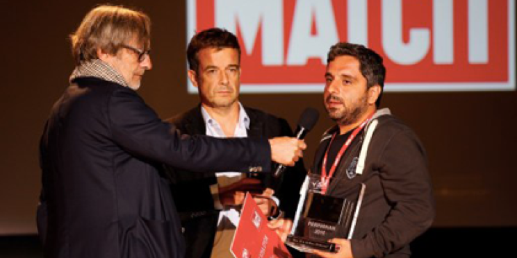 El fotógrafo de la AFP Bulent Kilic recibe el premio Visa d’Or News